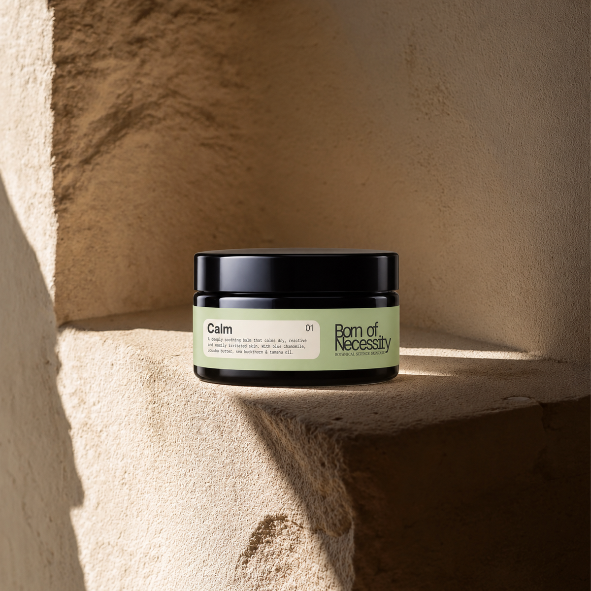 Calm balm jar on the signature sunlit stone ledge