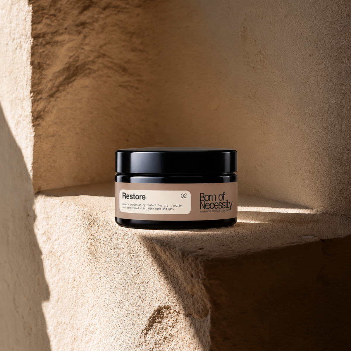 Restore hemp and oat balm jar on the signature sunlit stone ledge